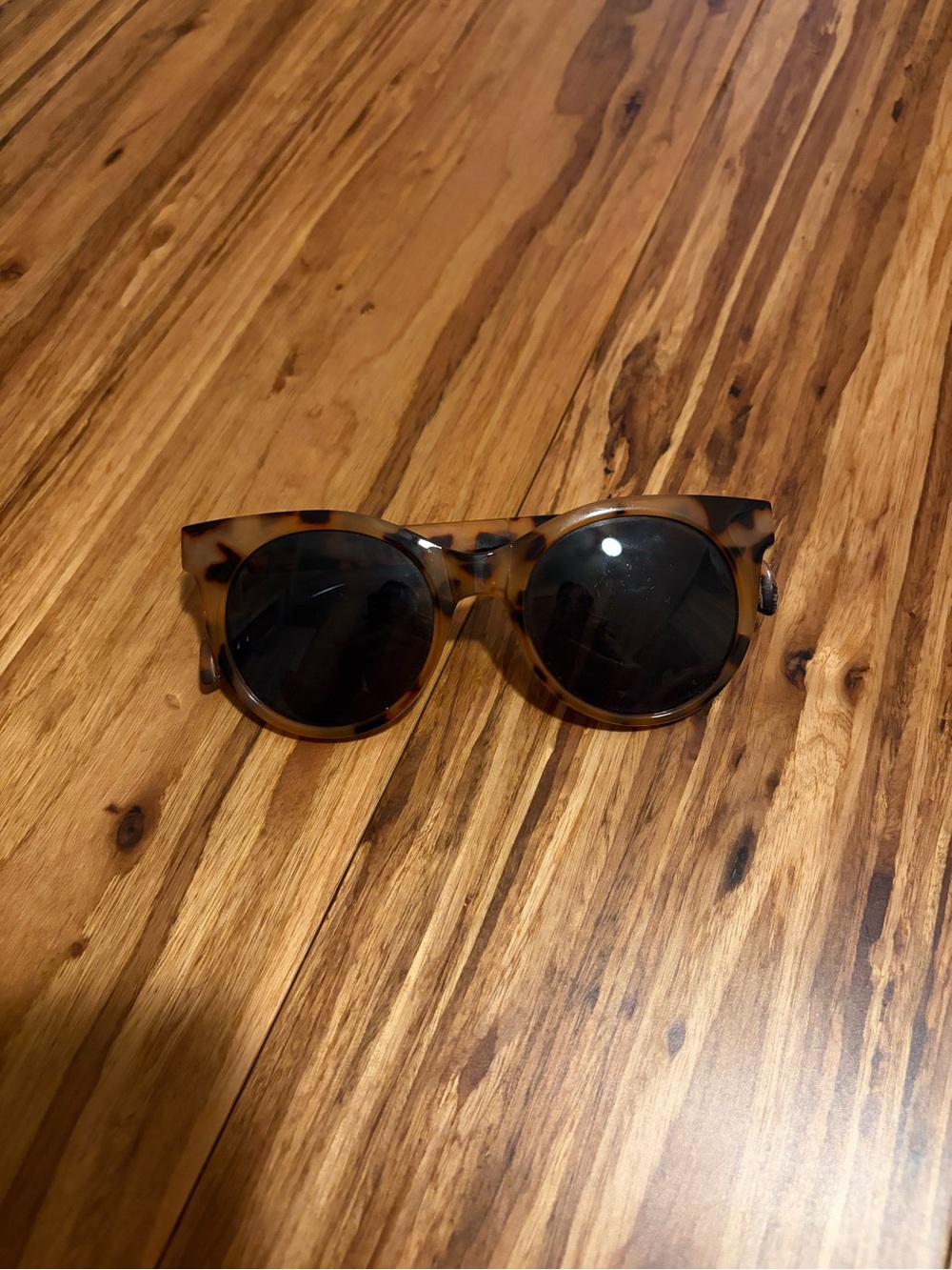 Round Tortoiseshell Sunglasses with Dark Lenses